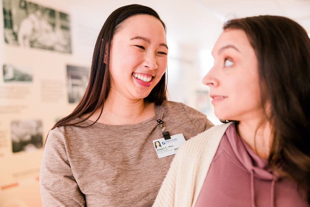 Image from Salem Health brand campaign; smiling doctor with patient