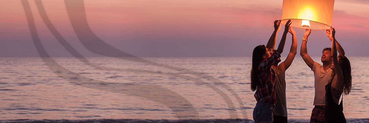 Image from Consano campaign of people holding a lantern